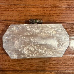 Marble acrylic clutch with snakeskin closure